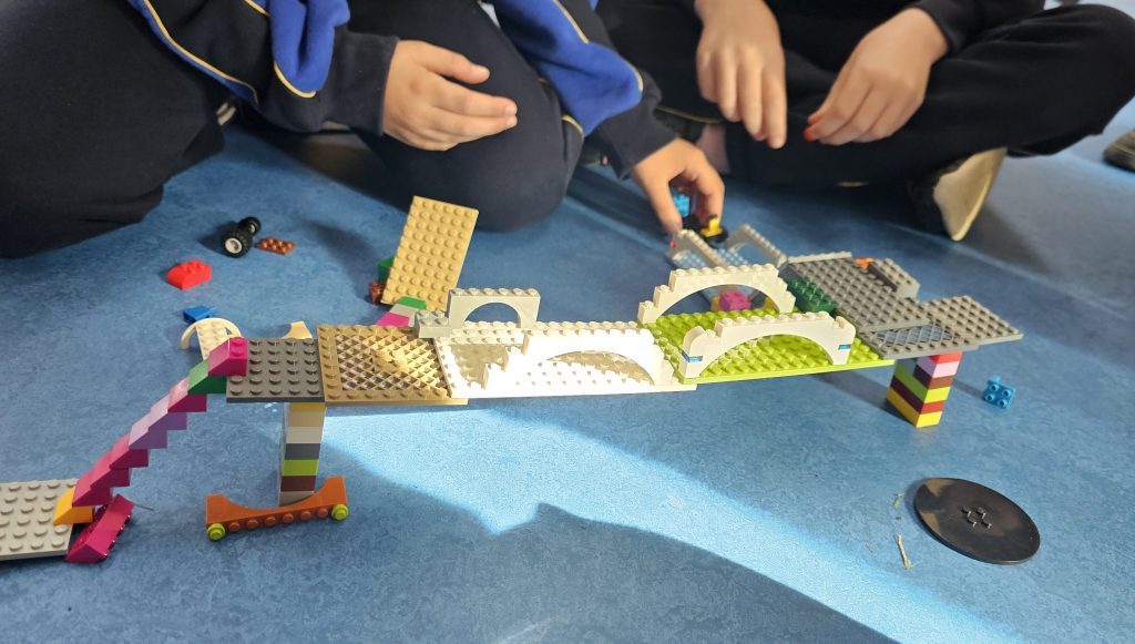 Lego bridge with hands still working